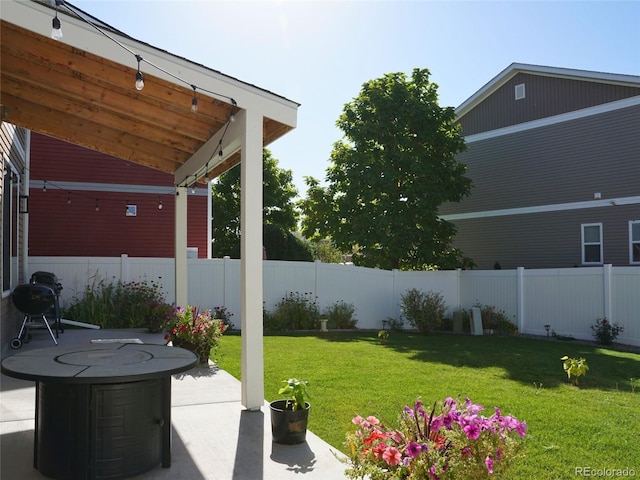 view of yard featuring a patio area and fence