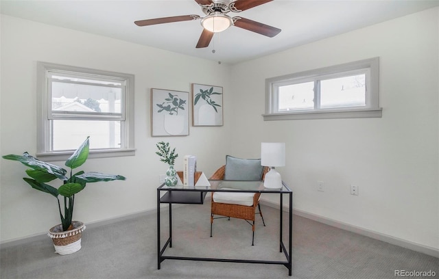 home office with baseboards, carpet flooring, and a ceiling fan