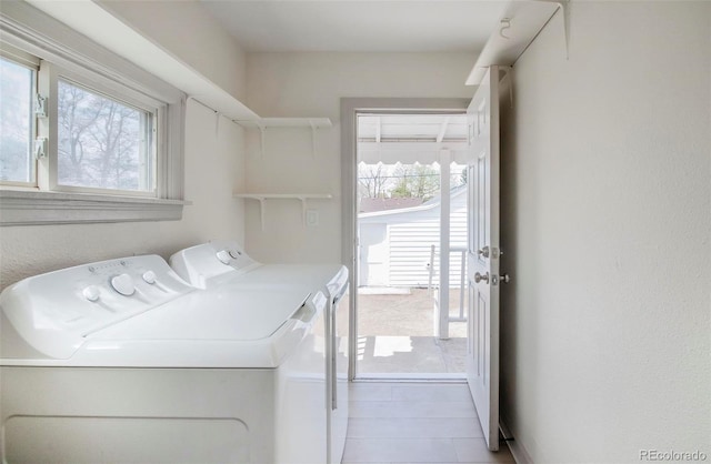 laundry area with independent washer and dryer and laundry area