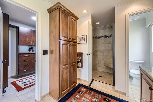 6451 Crestbrook Dr, Morrison, CO 80465 - full bathroom with a shower stall, toilet, tile patterned flooring, vanity, and recessed lighting