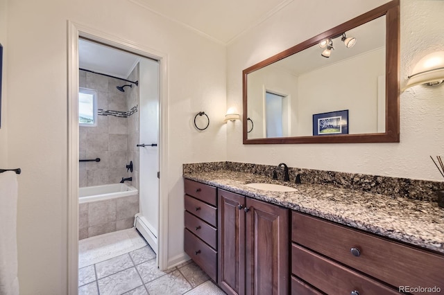 6451 Crestbrook Dr, Morrison, CO 80465 - bathroom featuring vanity, a baseboard radiator, ornamental molding, baseboards, and tiled shower / bath