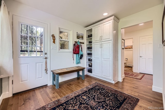 6451 Crestbrook Dr, Morrison, CO 80465 - mudroom with wood finished floors, a baseboard heating unit, baseboards, and recessed lighting