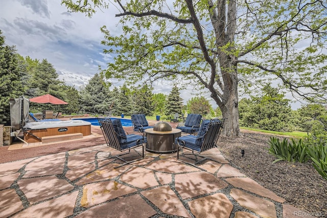 6451 Crestbrook Dr, Morrison, CO 80465 - view of patio / terrace featuring a hot tub, an outdoor fire pit, and an outdoor pool