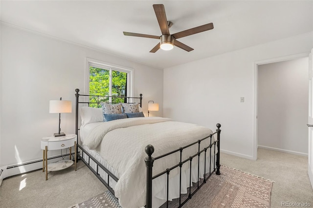 6451 Crestbrook Dr, Morrison, CO 80465 - bedroom with carpet floors, ceiling fan, and a baseboard radiator