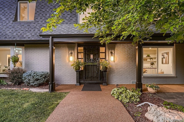 6451 Crestbrook Dr, Morrison, CO 80465 - doorway to property with brick siding and roof with shingles