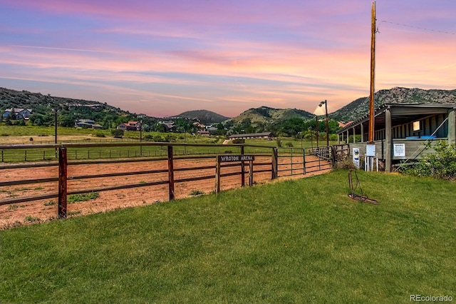 6451 Crestbrook Dr, Morrison, CO 80465 - yard at dusk featuring a mountain view and a view of countryside