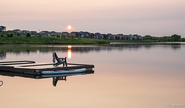 view of dock with a water view