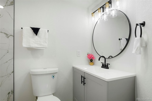 8701 Huron St Unit 2-106, Thornton, CO 80260 - bathroom featuring vanity and toilet