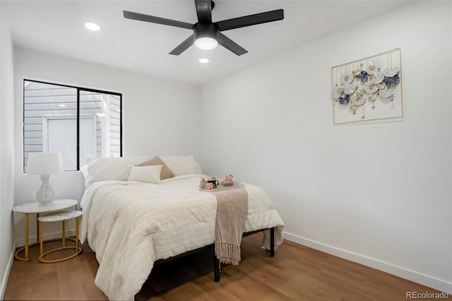 8701 Huron St Unit 2-106, Thornton, CO 80260 - bedroom with wood finished floors, recessed lighting, and ceiling fan