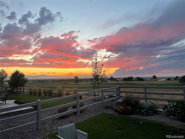 2355 Saddle Back Ct, Fort Lupton, CO 80621 - yard at dusk with fence and a rural view
