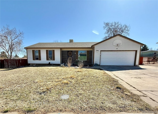 ranch-style house featuring fence, a garage, and driveway