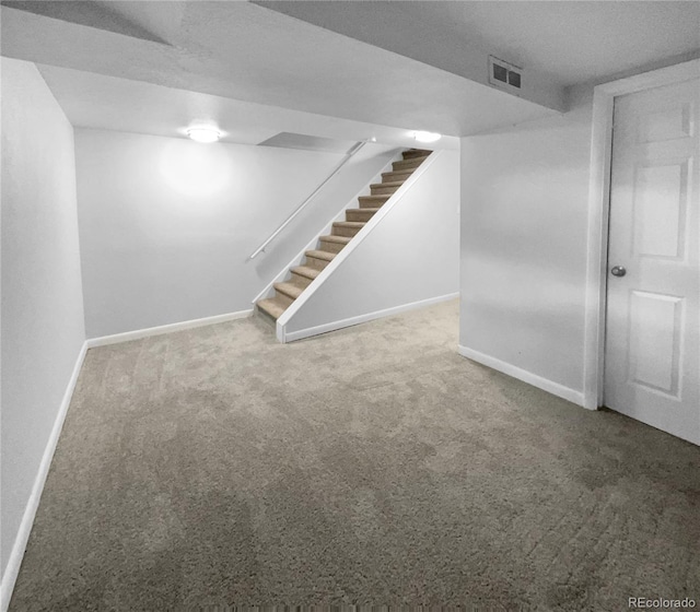 basement with carpet flooring