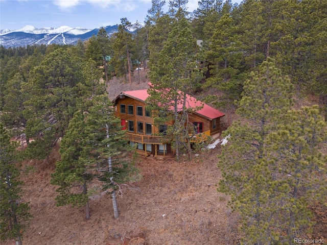 birds eye view of property with a mountain view