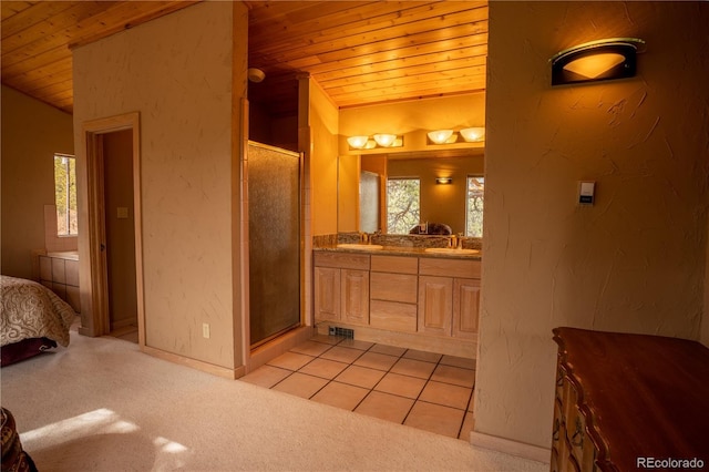 bathroom featuring lofted ceiling, a wealth of natural light, and wooden ceiling