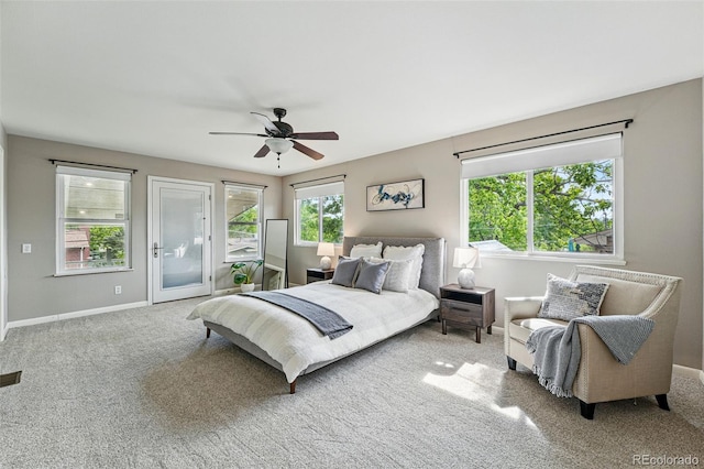 3570 E Arapahoe Pl, Centennial, CO 80122 - bedroom with access to exterior, carpet, baseboards, and ceiling fan