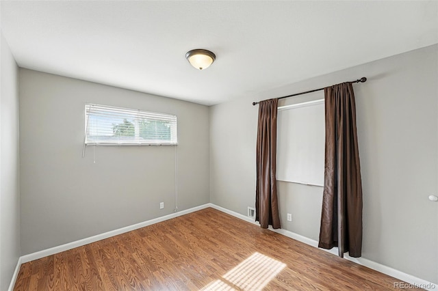 3570 E Arapahoe Pl, Centennial, CO 80122 - spare room with wood finished floors and baseboards