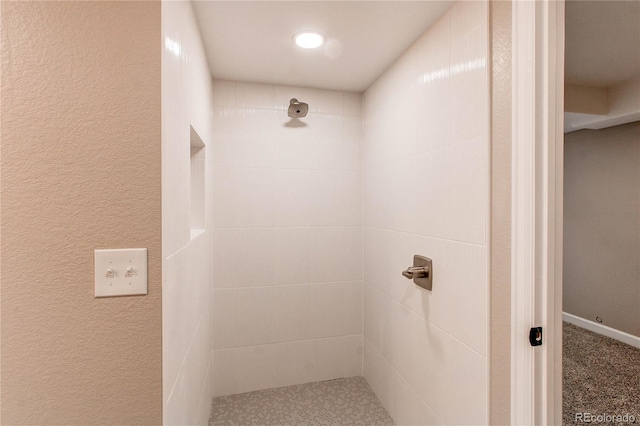 5597 S Buchanan St, Aurora, CO 80016 - bathroom with a tile shower