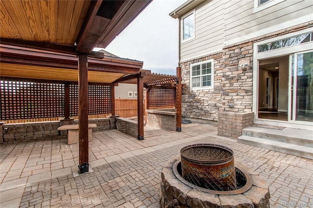 5597 S Buchanan St, Aurora, CO 80016 - view of patio / terrace featuring an outdoor fire pit and a pergola