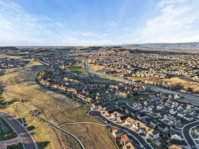 bird's eye view featuring a residential view and a mountain view