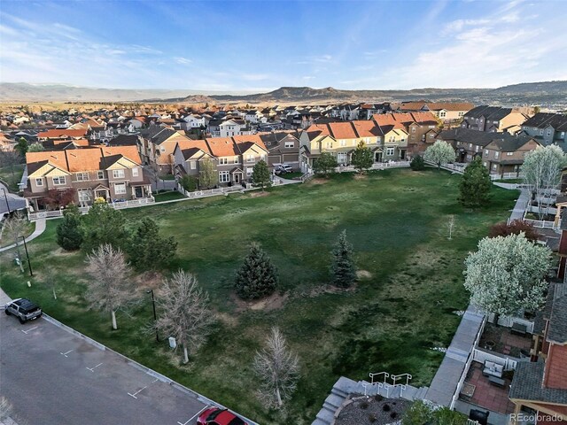 birds eye view of property with a residential view and a mountain view