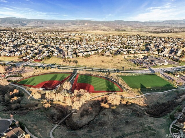 aerial view with a mountain view and a residential view