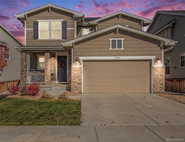 craftsman-style house with a porch and a garage