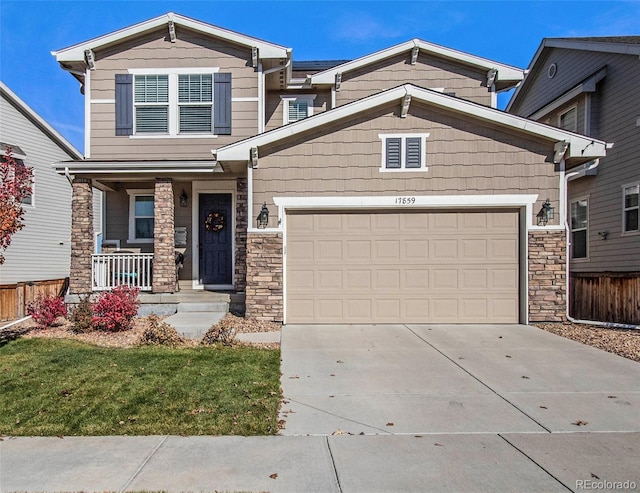 craftsman-style house featuring a porch and a garage