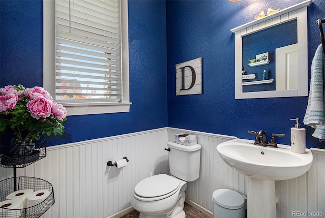 bathroom with toilet and sink