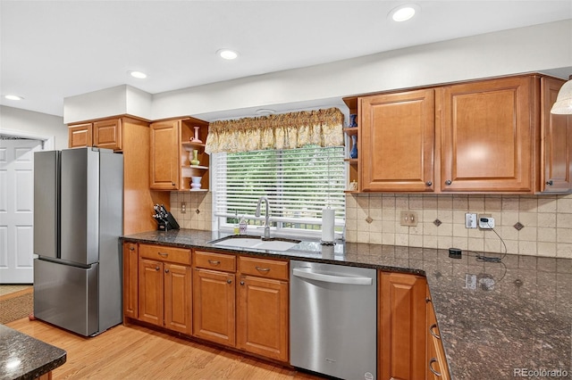 10328 W Crestone Mtn, Littleton, CO 80127 - kitchen featuring appliances with stainless steel finishes, open shelves, light wood-style floors, brown cabinetry, and recessed lighting