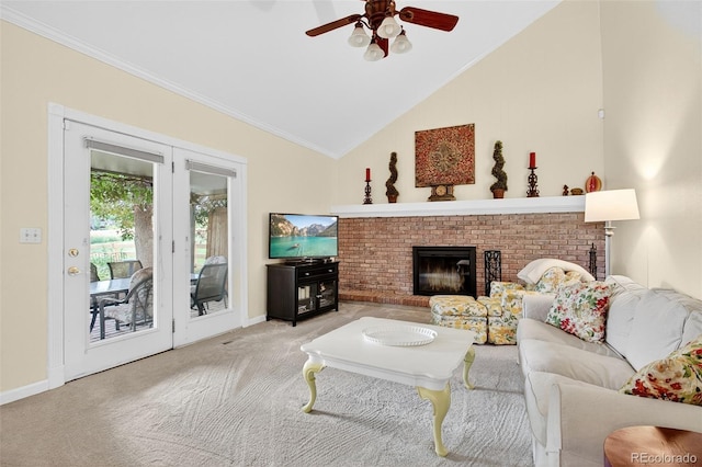 10328 W Crestone Mtn, Littleton, CO 80127 - living room featuring a ceiling fan, crown molding, vaulted ceiling, carpet, and a fireplace