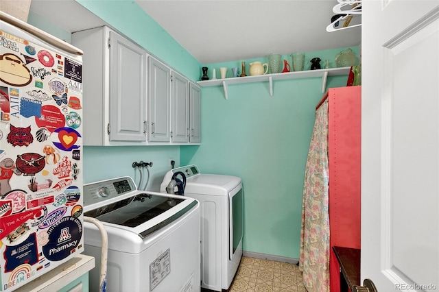 10328 W Crestone Mtn, Littleton, CO 80127 - washroom featuring washer and clothes dryer and cabinet space