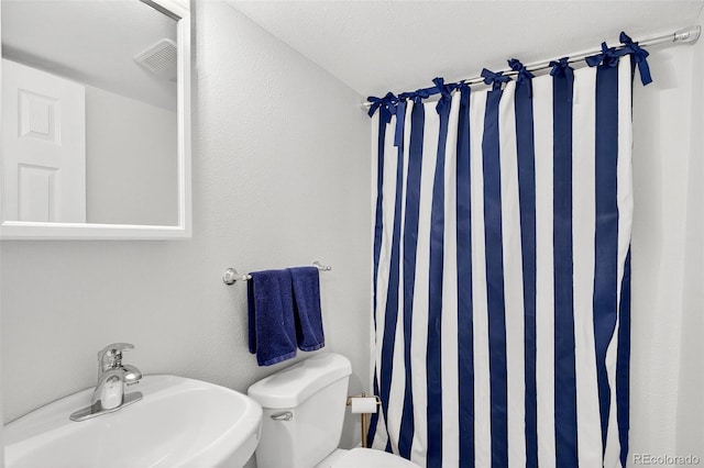10328 W Crestone Mtn, Littleton, CO 80127 - bathroom with a sink and curtained shower
