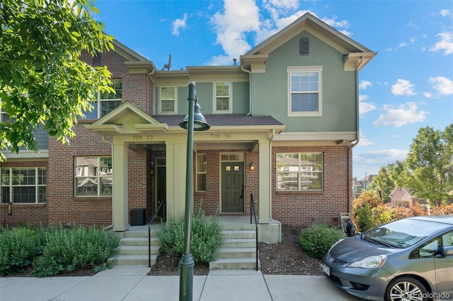 701 N Roslyn St Unit 36, Denver, CO 80230 - view of property with brick siding and stucco siding