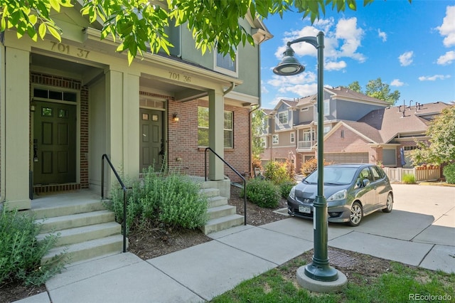 701 N Roslyn St Unit 36, Denver, CO 80230 - entrance to property with brick siding and a residential view