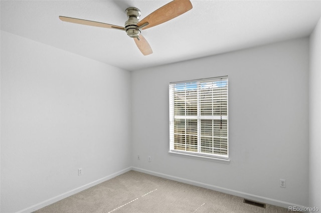 701 N Roslyn St Unit 36, Denver, CO 80230 - carpeted spare room with baseboards and ceiling fan