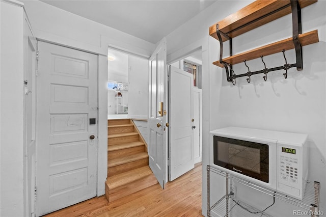 foyer with light wood-type flooring