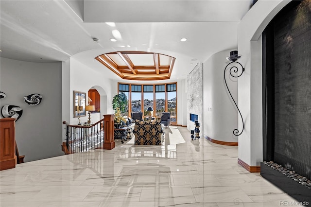 entrance foyer featuring coffered ceiling