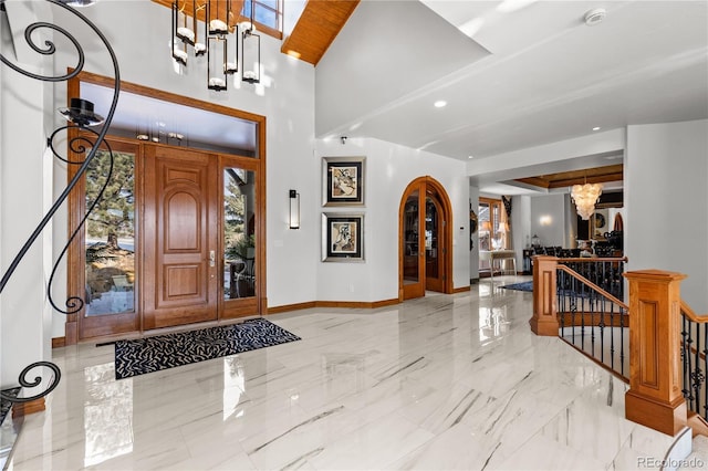 entrance foyer with a chandelier