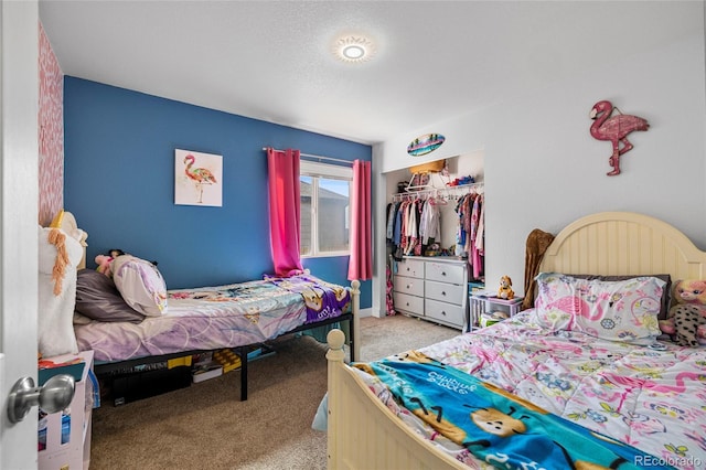 carpeted bedroom featuring a closet