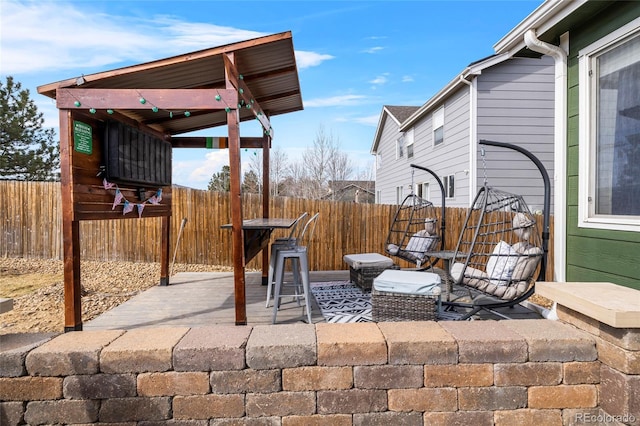 view of patio with fence