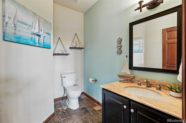 19640 Four Winds Way, Monument, CO 80132 - bathroom featuring stone tile floors and vanity