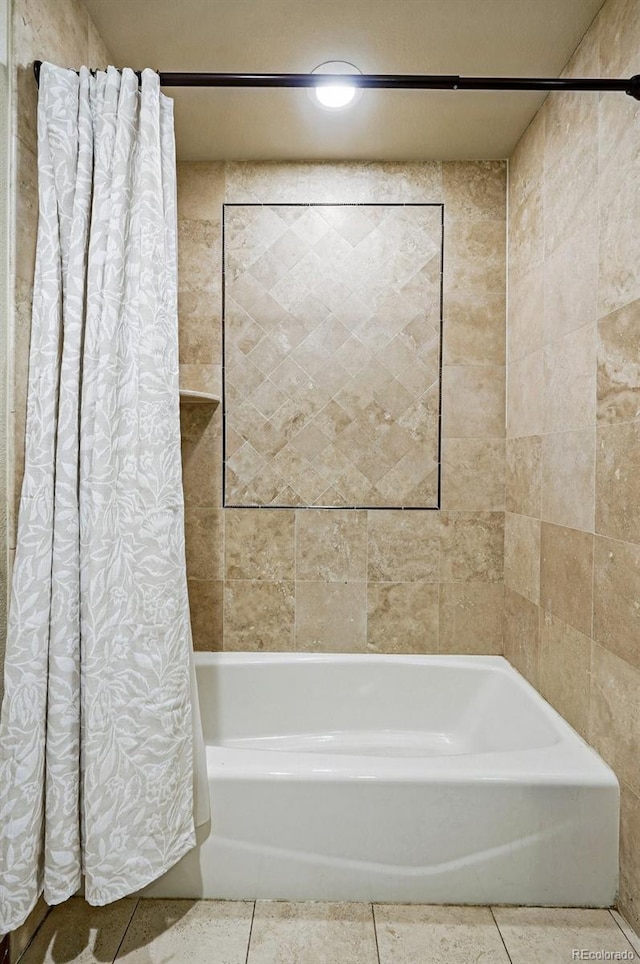 19640 Four Winds Way, Monument, CO 80132 - full bath featuring tile patterned floors and shower / tub combo with curtain