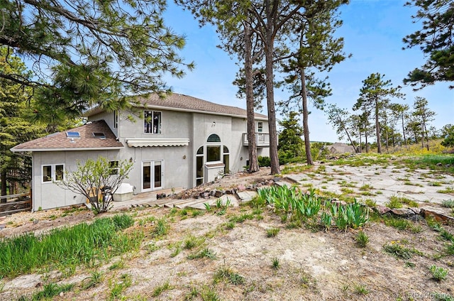 19640 Four Winds Way, Monument, CO 80132 - back of house featuring stucco siding