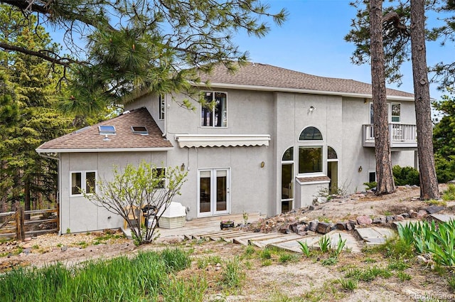 19640 Four Winds Way, Monument, CO 80132 - rear view of property featuring stucco siding, french doors, and a patio
