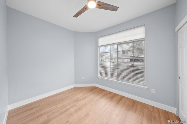 9590 E Florida Ave Unit 1025, Denver, CO 80247 - spare room featuring ceiling fan, light wood-style floors, and baseboards