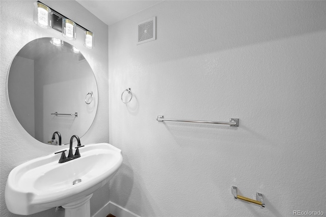 9590 E Florida Ave Unit 1025, Denver, CO 80247 - bathroom featuring a sink