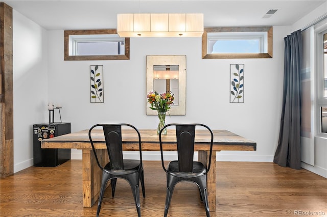 1930 W 35th Ave, Denver, CO 80211 - dining room featuring baseboards and wood finished floors