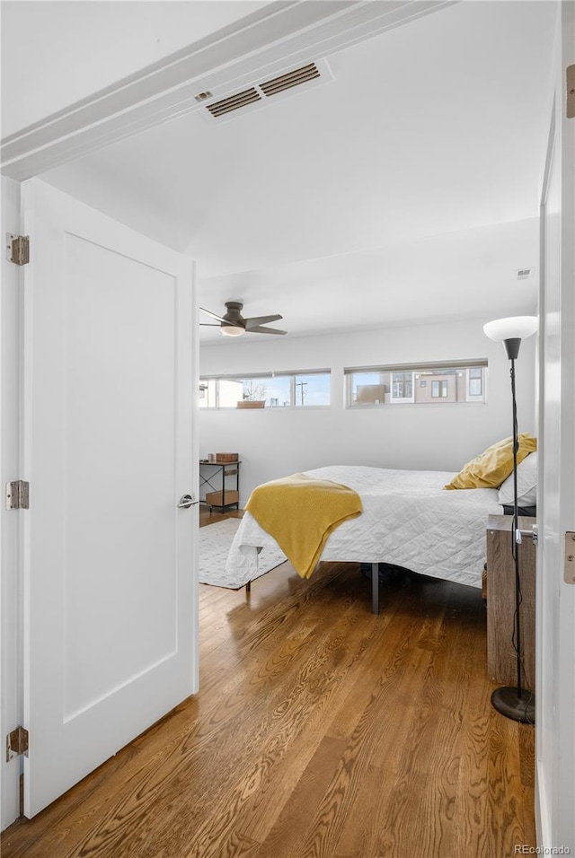 1930 W 35th Ave, Denver, CO 80211 - bedroom with wood finished floors and ceiling fan