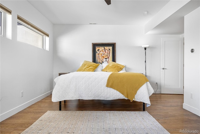 1930 W 35th Ave, Denver, CO 80211 - bedroom featuring baseboards and wood finished floors
