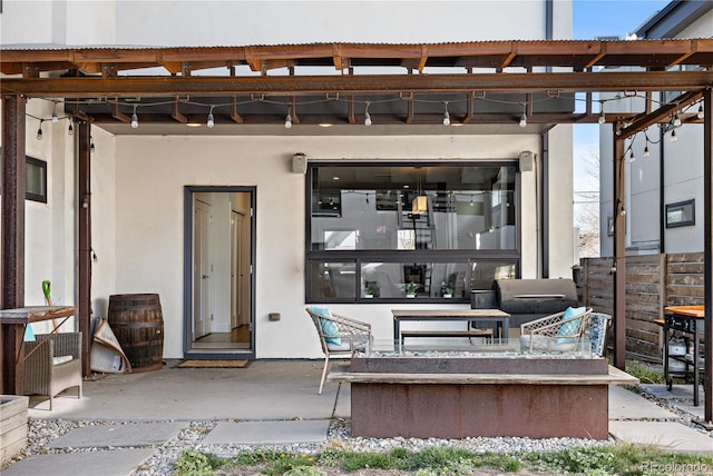 1930 W 35th Ave, Denver, CO 80211 - view of patio / terrace with an outdoor fire pit